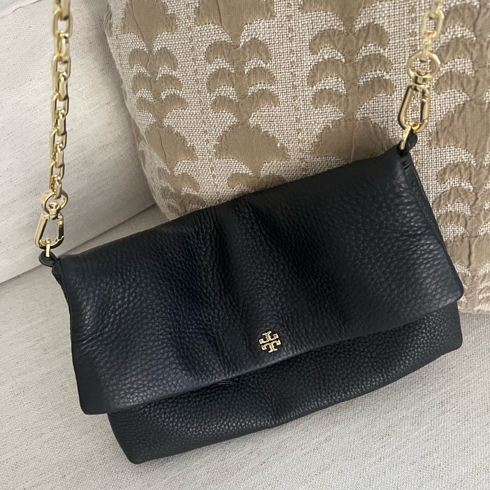 Tory burch crossbody in black and gold hardware.